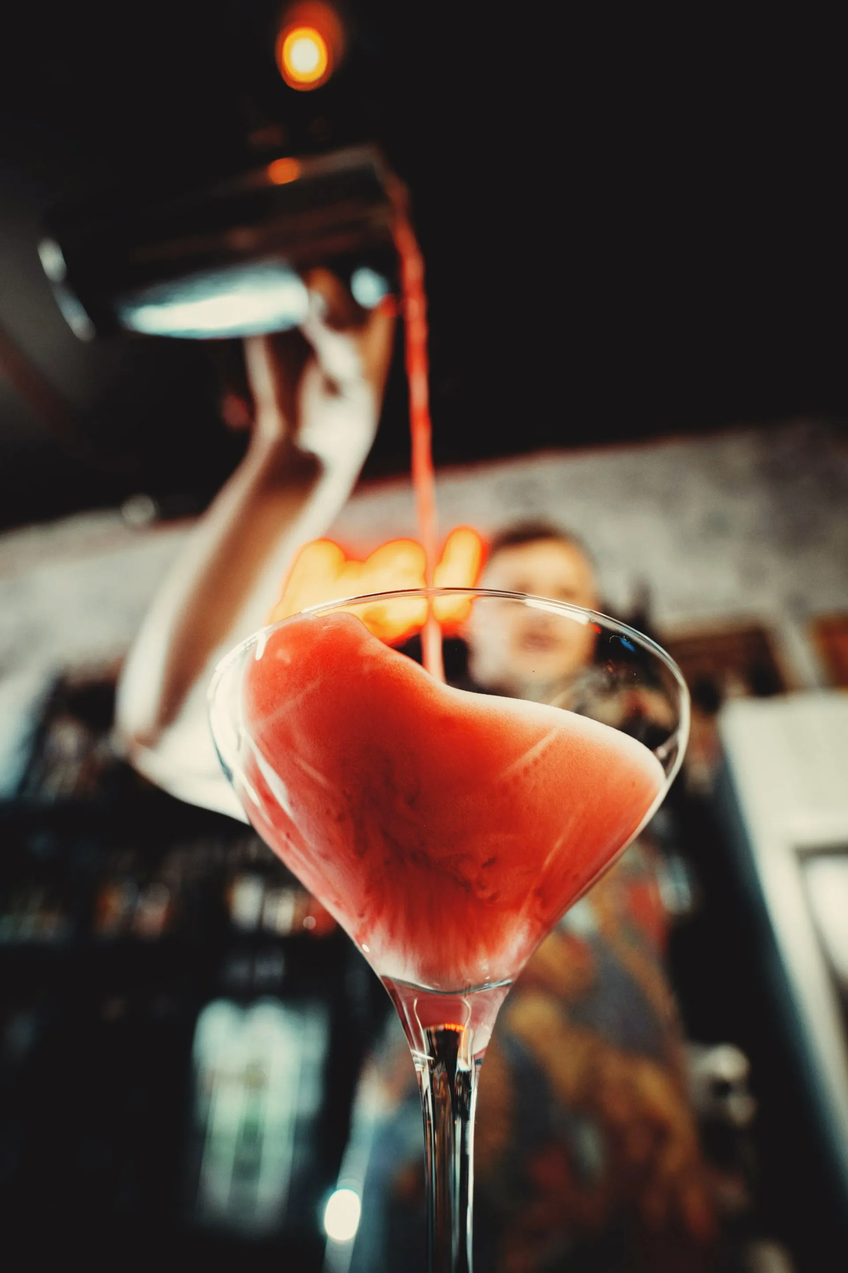 Bartender pouring drink